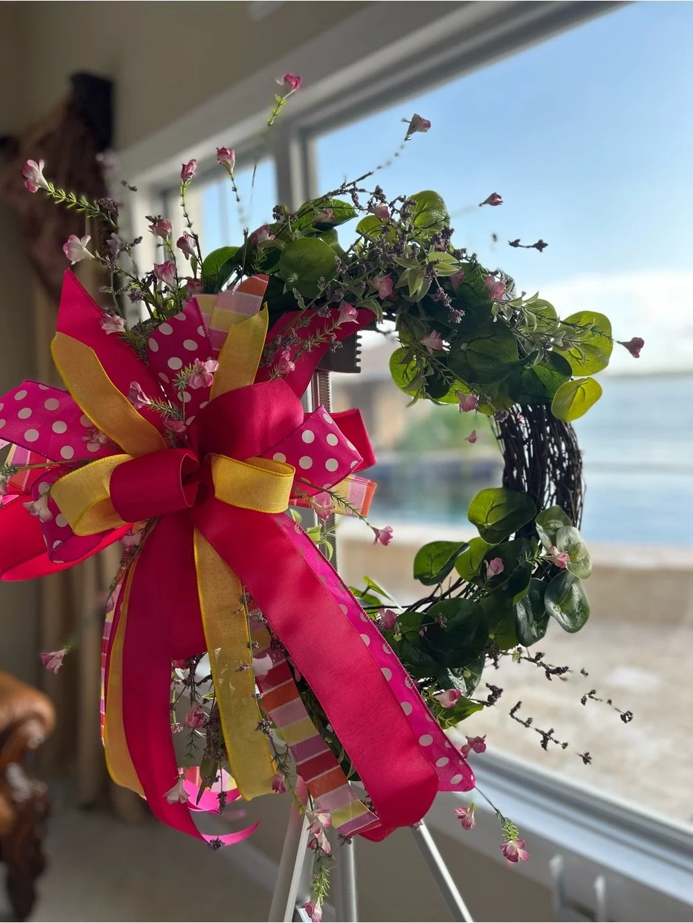 Floral Spring Wreath with Pink Ribbon Accent